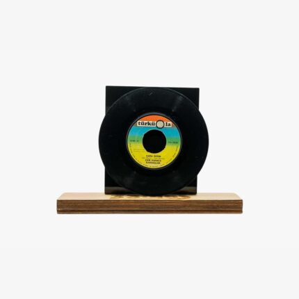 2301450060B | 3345 Records Black vinyl record mounted on a small wooden display base, with a colorful label at the center.